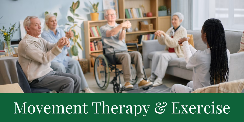 A group of seniors, including a person in a wheelchair, follow a seated instructor in a light-filled room, performing hand and arm exercises. Text at the bottom reads “Movement Therapy & Exercise.”.