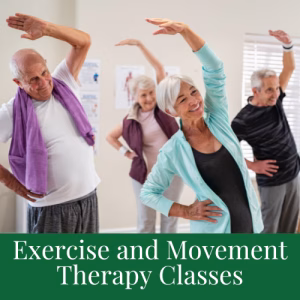 Four older adults smile as they participate in a group exercise class, standing in a line and stretching with one arm raised overhead. Text below reads: Exercise and Movement Therapy Classes.