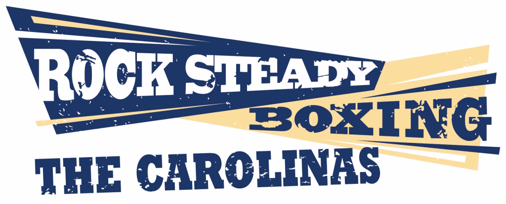 Logo with bold, distressed text reading Rock Steady Boxing The Carolinas in navy blue and yellow geometric shapes behind the words.